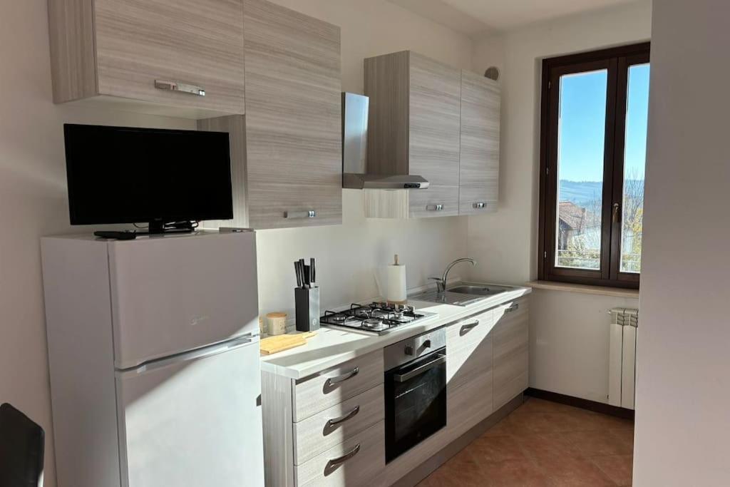 Appartement Casa Al Poggio à Castana  Extérieur photo